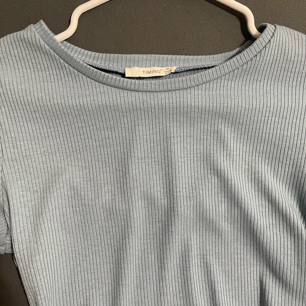 light blue open back crop top